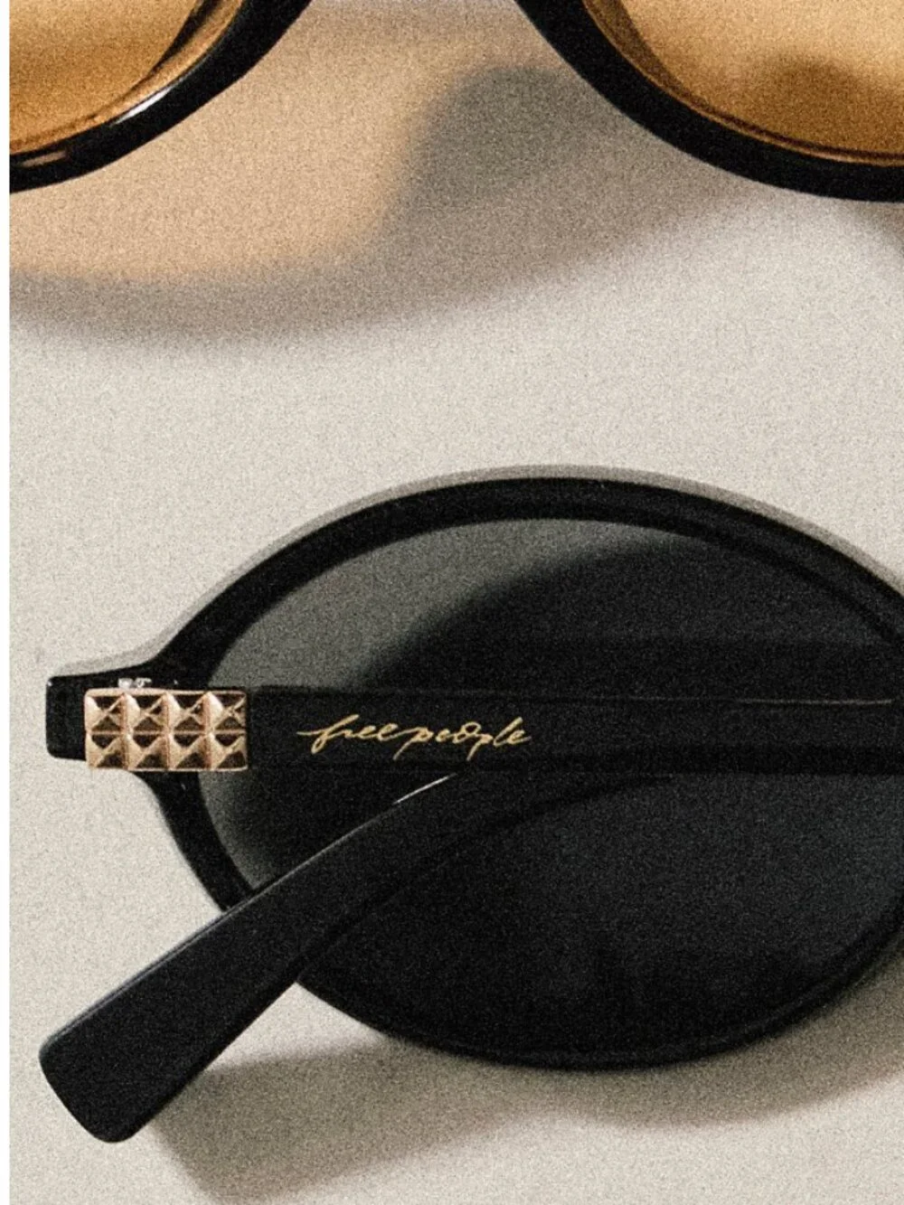 Free People Black Oval Sunglasses with Slim Frame